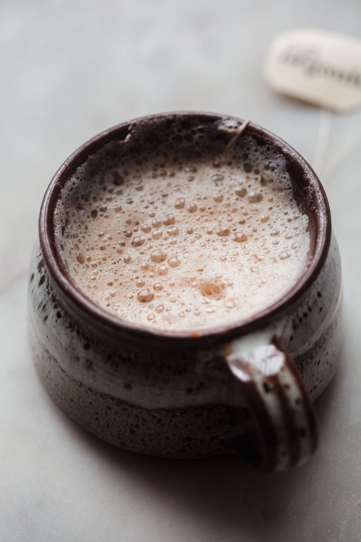 brown mug with a prepared foamy London fog latte