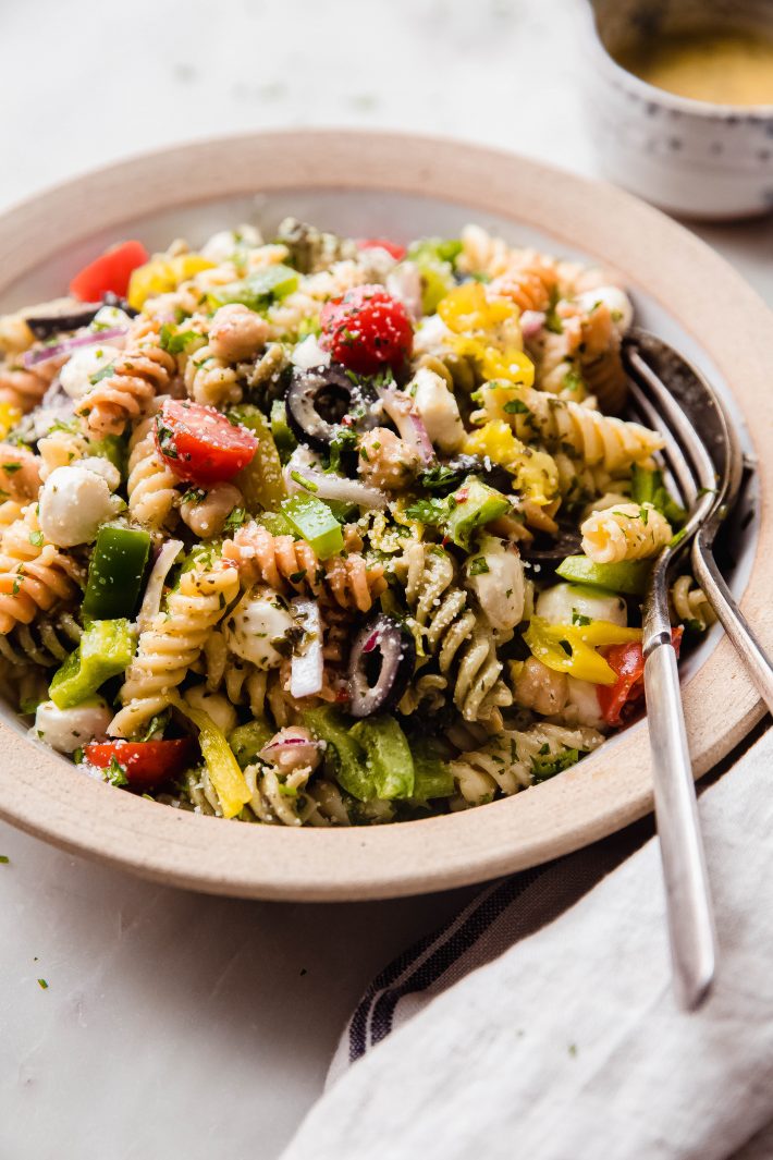 showing veggies and parmesan on italian pasta salad
