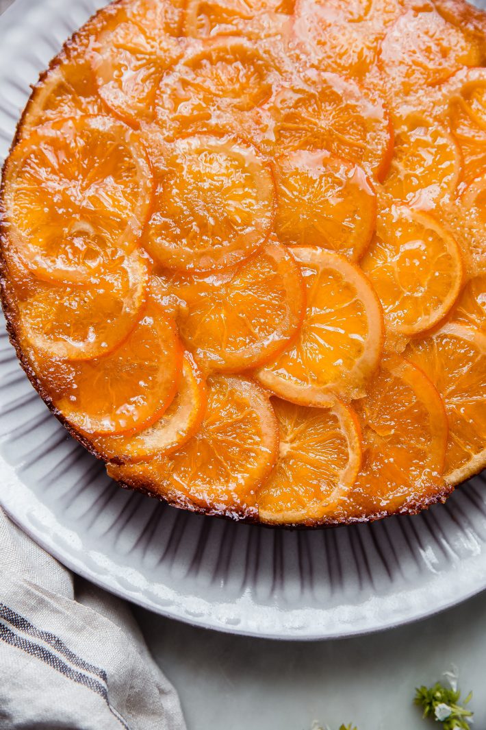 sliced candied oranges showing cake before slicing
