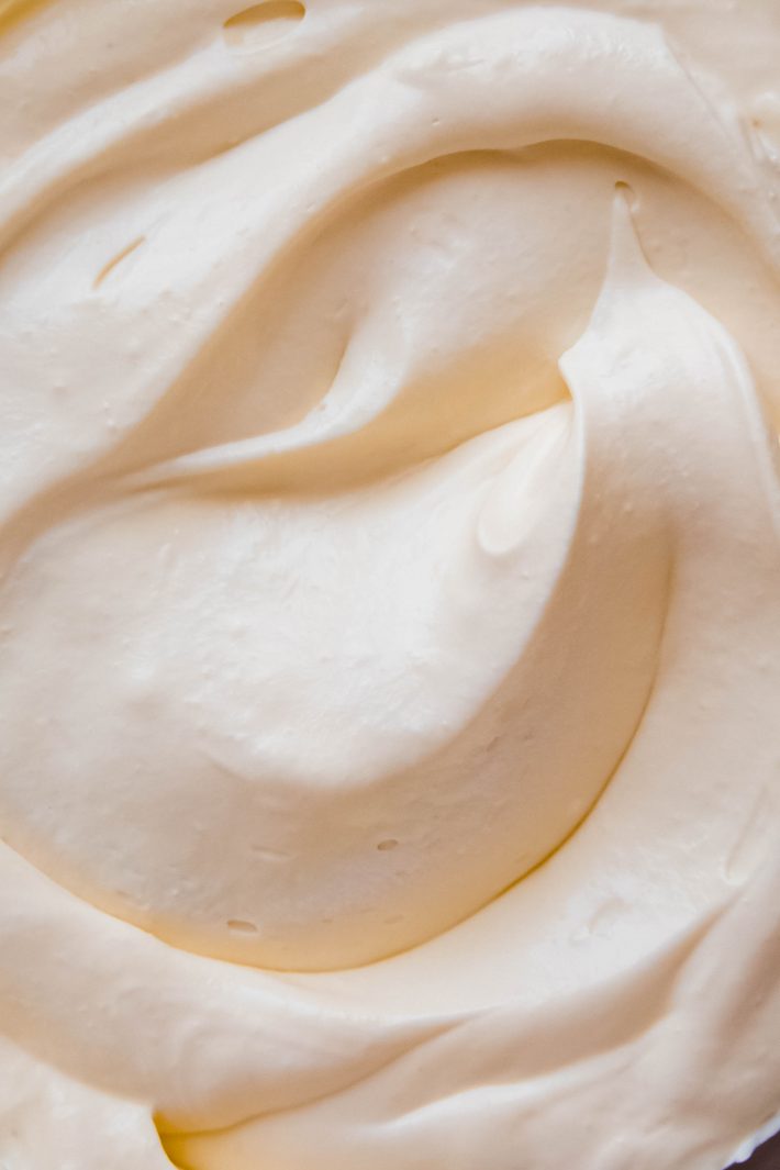 swirled whipped cream mixed with vanilla pudding