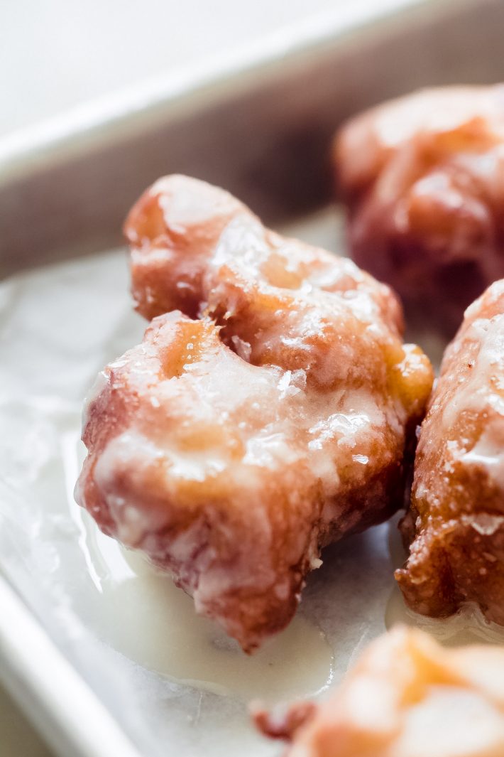 close up shot of fritter with sparkling sugar